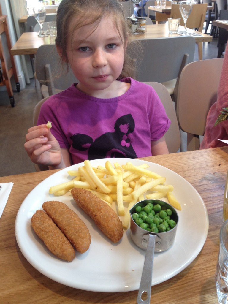 Children's portion of Cod Goujons, fries and peas. Perfectly cooked.