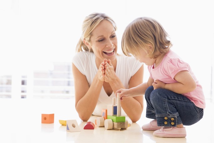 Mother and child learning through play