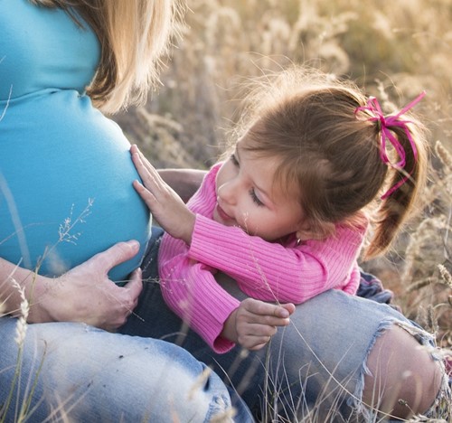 Pregnant Mum with Child