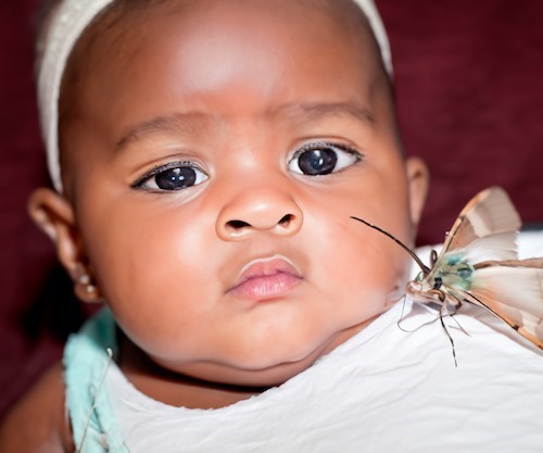 Baby with Moth