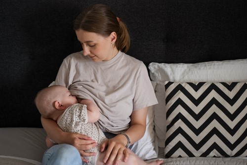 Should You Pause Breastfeeding When Sick?  image