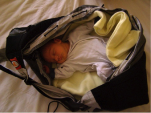 Sleeping baby in a bag