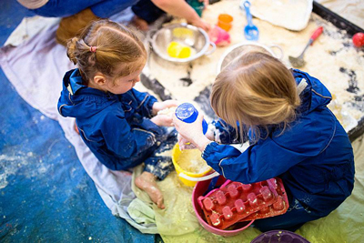 Messy play provides an excellent opportunity for under 5s to work on their fine motor skills.